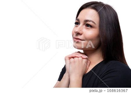 Young dreamy european woman dressed in basic t-shirt closeup Young dreamy european woman dressed in basic t-shirt closeup 108616367
