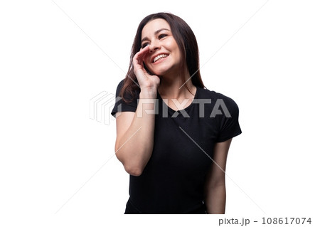 Young charming lady with brown eyes on a background with copy space 108617074