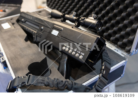 Black gun with mounted equipment - anti drone weapon 108619109
