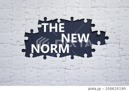 The new norm symbol. Concept words The new norm on white puzzle. Beautiful dark blue background. Business and The new norm concept. Copy space. 108628190