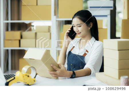 Small business owners, startup and e-commerce concept. Small business owners, startup and e-commerce concept. 108629496