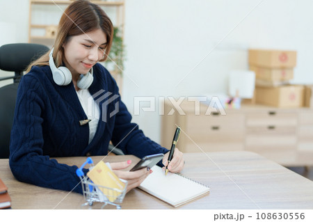 Online Shopping and Internet Payments, Asian man are using their credit card and mobile phone to shop online or conduct errands in the digital world 108630556