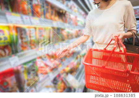 Asian woman consumer choosing asia food product at supermarket store 108631385