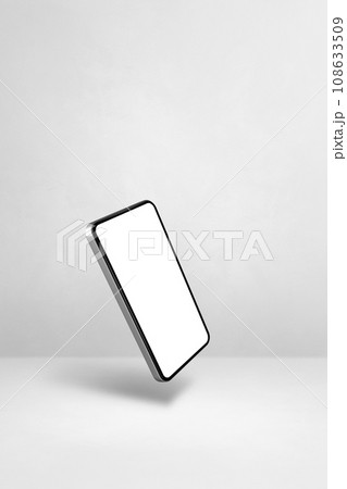 Floating smartphone isolated on white. Vertical background Floating smartphone isolated on white. Vertical background 108633509