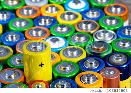 Old used batteries. Batteries background Old used batteries. Batteries background 108635608