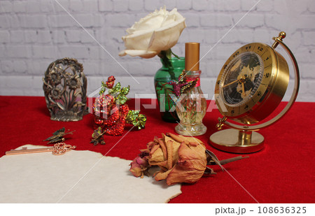 White Rose in Vase Next to Vintage Rhinestone Rose and Perfume Bottle White Rose in Vase Next to Vintage Rhinestone Rose and Perfume Bottle 108636325