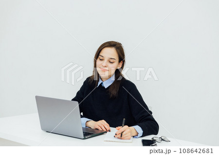 remote work woman with laptop via internet conversation online remote work woman with laptop via internet conversation online 108642681