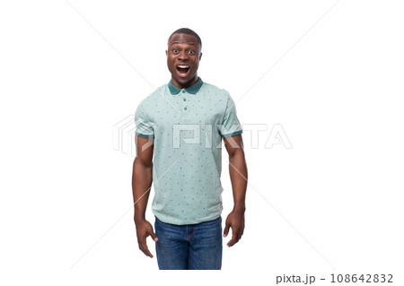 young slender American man dressed in a T-shirt is surprised and opened his mouth young slender American man dressed in a T-shirt is surprised and opened his mouth 108642832