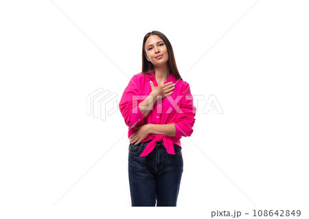 young employee of an office company woman dressed in a pink shirt on a white background with copy young employee of an office company woman dressed in a pink shirt on a white background with copy 108642849