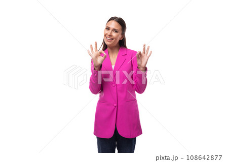 young well-groomed smiling brunette successful boss woman dressed in a crimson jacket on a white 108642877