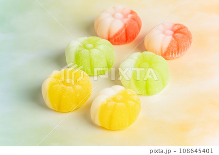 Gummies placed on a colorful background board. Gummies placed on a colorful background board. 108645401