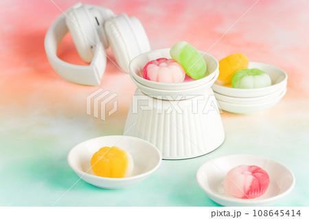 Gummies placed on a colorful background board. Gummies placed on a colorful background board. 108645414