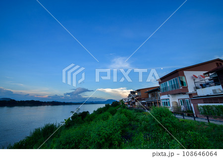 Landscape of classic wooden house beside the Mekong river in Chiang Khan district, Loei. Travel concept Landscape of classic wooden house beside the Mekong river in Chiang Khan district, Loei. Travel concept 108646064