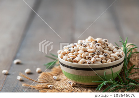navy bean or white kidneys beans on wood background. 108646076