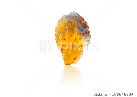 Macro mineral stone Fluorite yellow and blue color on a white background Macro mineral stone Fluorite yellow and blue color on a white background 108646234