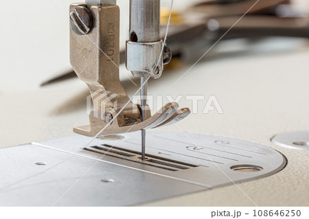 Sewing machine needle with thread and fabric 108646250