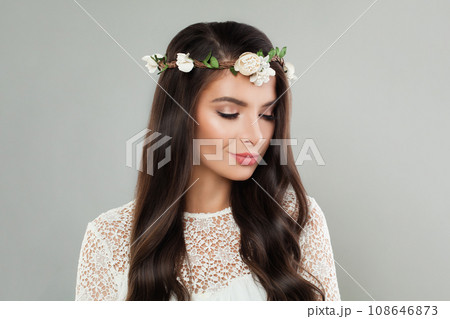 Stylish beautiful woman brunette with long healthy shiny dark brown straight hair, clean skin 108646873