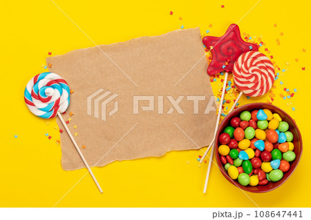Candy sweets and blank greeting card for your greetings Candy sweets and blank greeting card for your greetings 108647441