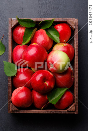Wooden box with fresh red apples Wooden box with fresh red apples 108647471
