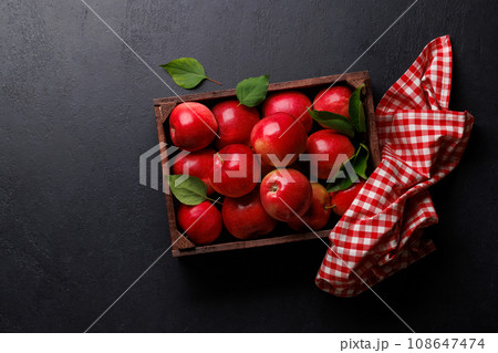 Wooden box with fresh red apples Wooden box with fresh red apples 108647474
