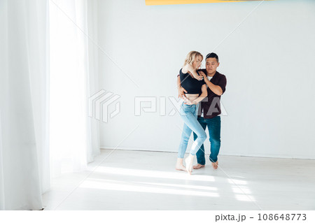 Couple dancers man and woman dancing in studio workout 108648773