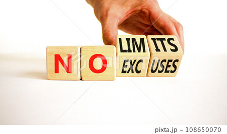 No excuses and limits symbol. Concept words No excuses No limits on wooden block. Beautiful white table white background. Businessman hand. Business motivational no excuses limits concept. Copy space. 108650070
