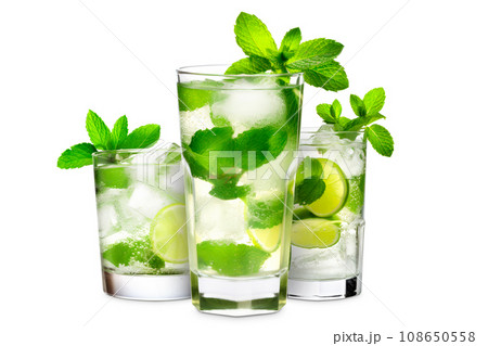 Set of Mojito cocktails, garnished with fresh mint and a slice of lime in a tall glass 108650558
