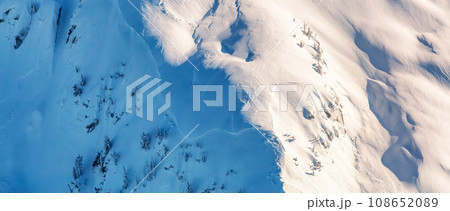 Snow covered Mountain Peak. Canadian Nature Aerial Background Panorama. Snow covered Mountain Peak. Canadian Nature Aerial Background Panorama. 108652089