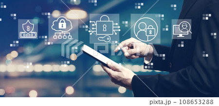Data Security concept with businessman using a tablet Data Security concept with businessman using a tablet 108653288