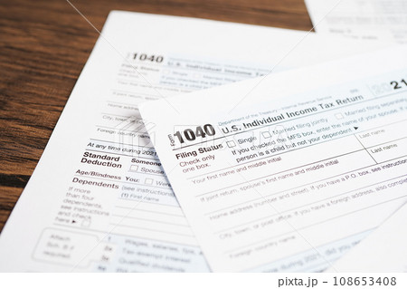 Tax form 1040 U.S. Individual Income Tax Return, business finance concept. Tax form 1040 U.S. Individual Income Tax Return, business finance concept. 108653408