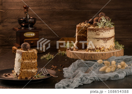 Slice of delicious naked coffee and hazelnuts cake 108654388