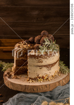 Slice of delicious naked coffee and hazelnuts cake Slice of delicious naked coffee and hazelnuts cake 108654396