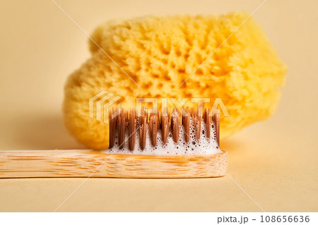 Toothbrush with toothpaste foam close-up. Toothbrush with toothpaste foam close-up. 108656636