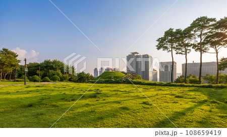 Sunset over the Namsan Park viewpoint with modern skyscrapers in Seoul, South Korea 108659419