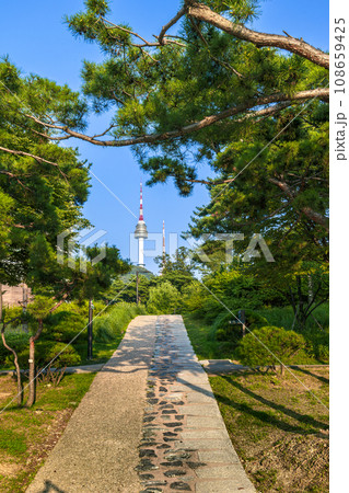 The N-Seoul Tower stands majestically beautiful when viewed from Namsan Park in the evening before sunset The N-Seoul Tower stands majestically beautiful when viewed from Namsan Park in the evening before sunset 108659425