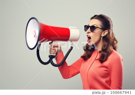 A Chic Brunette Lady Shouting into a Loudspeaker A Chic Brunette Lady Shouting into a Loudspeaker 108667941