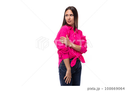 well-groomed young employee office woman dressed in a pink stylish shirt on a white background with well-groomed young employee office woman dressed in a pink stylish shirt on a white background with 108669064
