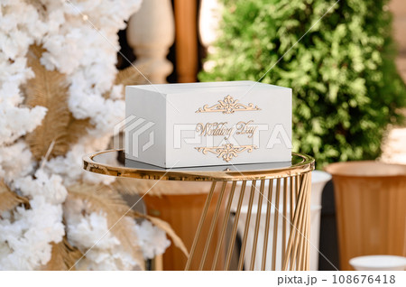 Wedding box for a monetary greeting. Inscription wedding day. 108676418