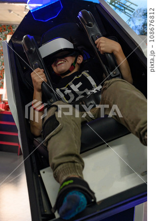 Happy reactions in a child from an attraction with a virtual reaction Happy reactions in a child from an attraction with a virtual reaction 108676812