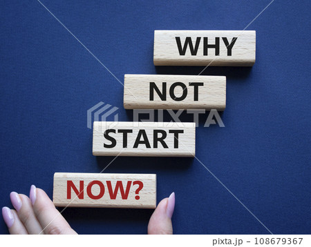 Why not start now symbol. Concept words Why not start now on wooden blocks. Beautiful deep blue background. Businessman hand. Business and Why not start now concept. Copy space. 108679367