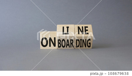Online Onboarding symbol. Turned wooden cubes with words Online Onboarding. Beautiful grey background. Business and Online Onboarding concept. Copy space 108679638