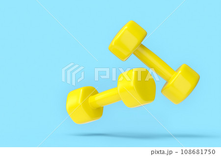 Pair of rubber yellow dumbbells isolated on blue background 108681750