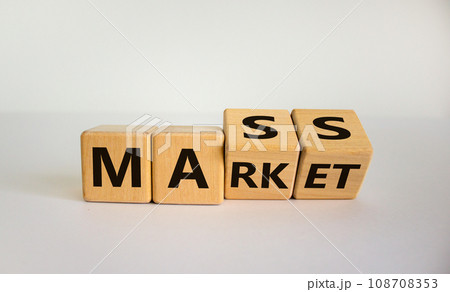 Mass market symbol. Turned wooden cubes with words 'mass market'. Beautiful white background, copy space. Business and mass market concept. 108708353