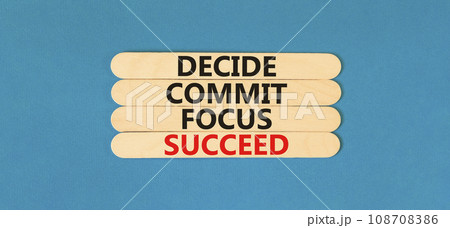 Decide commit focus succeed symbol. Concept word Decide Commit Focus Succeed on beautiful wooden stick. Beautiful blue table blue background. Business decide commit focus succeed concept. Copy space. Decide commit focus succeed symbol. Concept word Decide Commit Focus Succeed on beautiful wooden stick. Beautiful blue table blue background. Business decide commit focus succeed concept. Copy space. 108708386