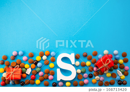 St.Nicholas day 5th of December, chocolate spicy ginger cookies and letter on blue background 108713420