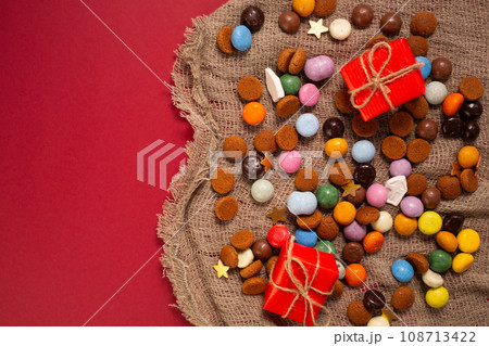 St.Nicholas day 5th of December, chocolate spicy ginger cookies on burlap. St.Nicholas day 5th of December, chocolate spicy ginger cookies on burlap. 108713422