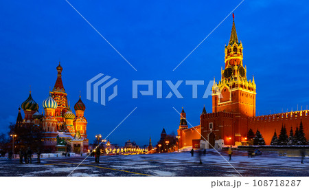 Spasskaya Tower and Saint Basils Cathedral on Red Square in Moscow on winter evening 108718287