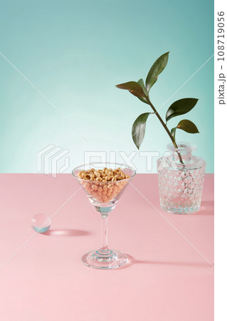 A lot of soybeans are contained inside a cocktail glass, decorated with a pot of green leaves. Soy milk contains plenty of antioxidants A lot of soybeans are contained inside a cocktail glass, decorated with a pot of green leaves. Soy milk contains plenty of antioxidants 108719056