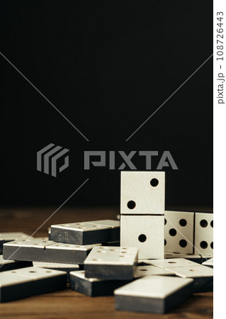 Domino tiles on wooden background close up Domino tiles on wooden background close up 108726443