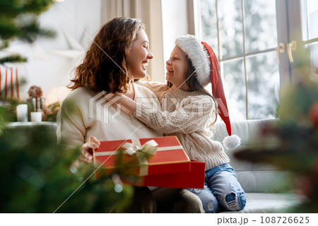 family celebrating Christmas family celebrating Christmas 108726625